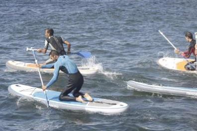 Men practicing Paddleboard